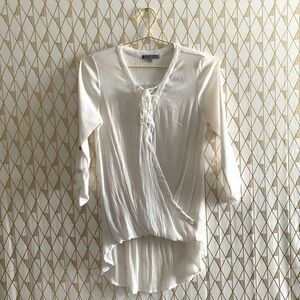 White pleated blouse​
